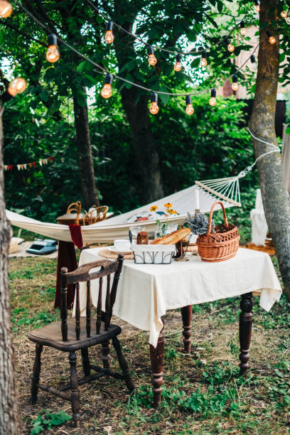 istock Dinner table in the backyard outdoors in countryside, nobody. 1332755807