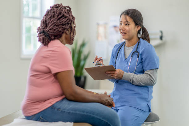 istock Doctor appointment with a middle aged woman 1332763533