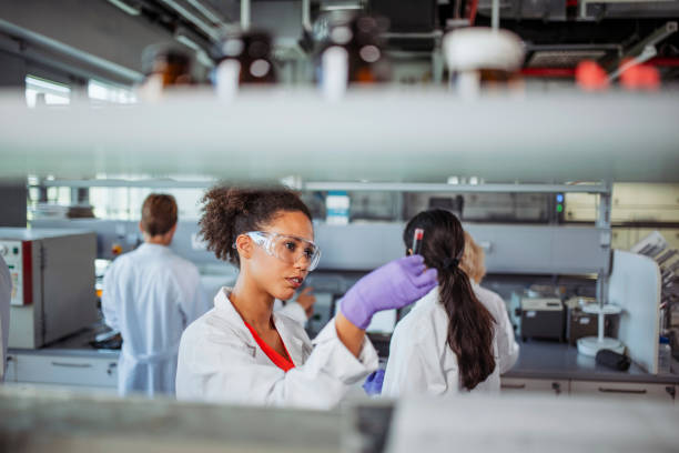 Female Mixed Race University Student Working in Laboratory