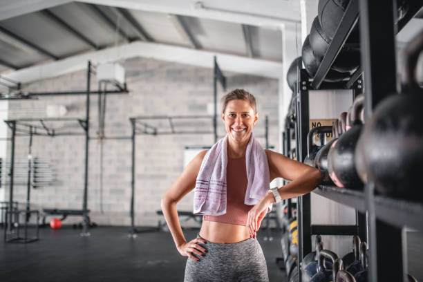 istock Cheerful Mid 20s Female Athlete After Workout at Gym 1332764032