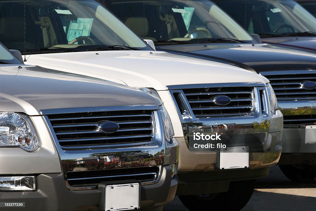 Car Dealership SUVs lined up at a car dealership. Sports Utility Vehicle Stock Photo
