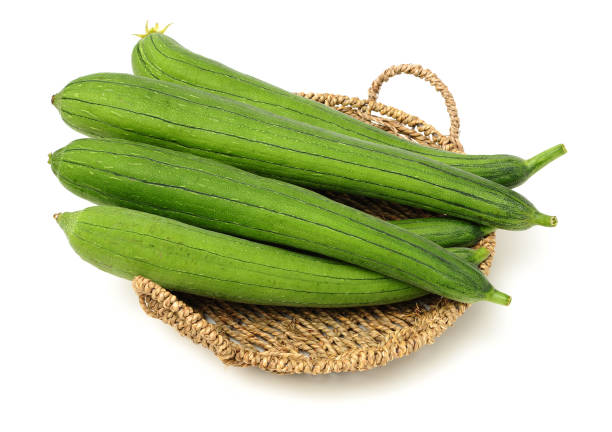 fresh loofah fresh loofah on the white background slate ridge stock pictures, royalty-free photos & images