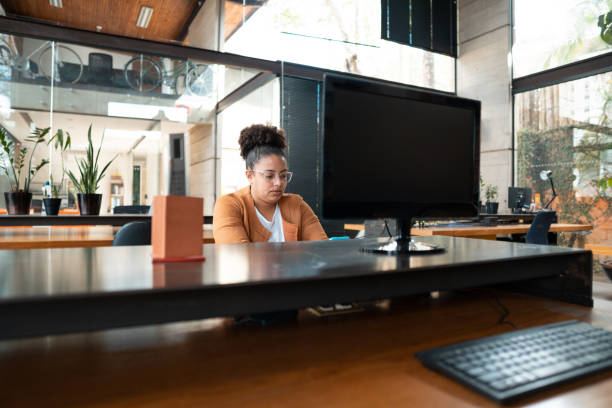istock Afro woman secretary working creative office 1332775547