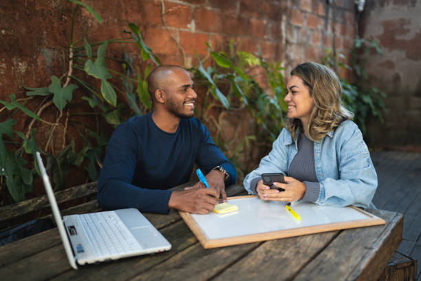 istock Coworkers bulletin board 1332775665