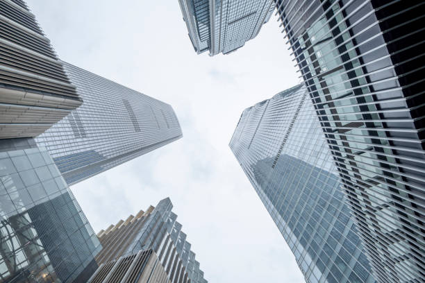 istock Skyscrapers under blue sky and white clouds in downtown district 1332785854
