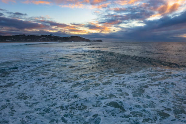 istock Surfs up - aerial sunrise seascape 1332786704
