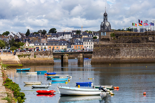 Concarneau (Brittany) - Old village with low tide\nAll logo's and recognizable people have been removed or blurred.