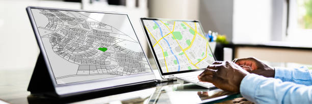 Businessperson Analyzing Cadastre Map On Computer Close-up Of A Businessperson Analyzing Cadastre Map On Computer In The Office land planning stock pictures, royalty-free photos & images