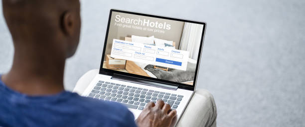 istock Man Searching And Booking Hotel Online 1332793239