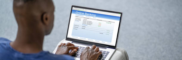 istock African American Man Using Online Bank App To Pay 1332793242