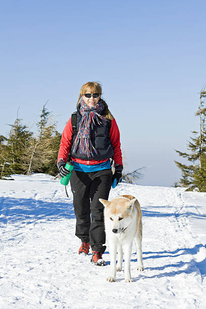 istock Hiking with dog in winter 133279690