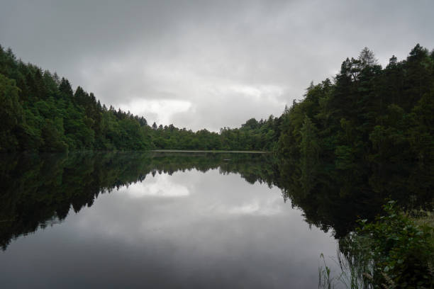 istock Gloomy scenes over a loch in Scotland 1332800247