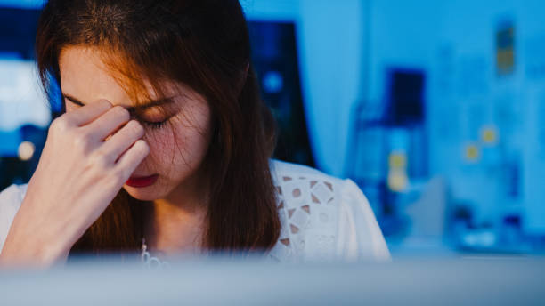 istock Freelance Asia women using laptop hard work at new normal home office. 1332802703