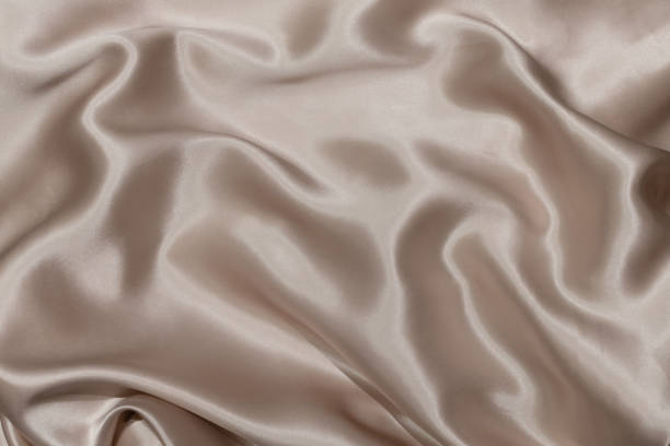 istock The texture of the mullbery silk textile fabric pink color for background 1332803504