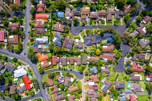 Aerial view of Suburban roof tops directly above