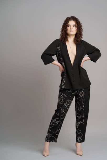 istock Curly woman portrait on gray background 1332805793