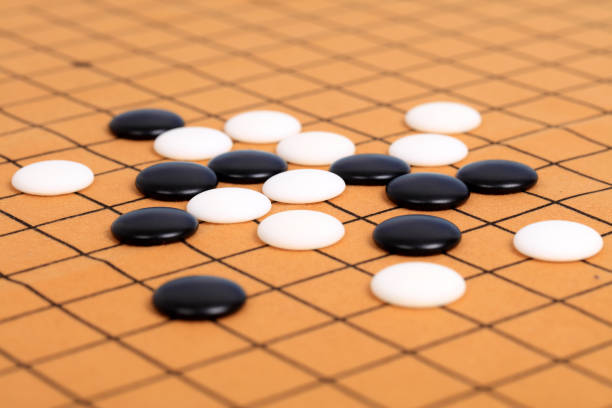istock chinese game go,  Gobang and go game board 1332806455