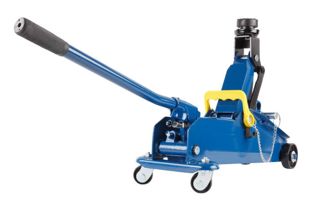 istock blue hydraulic car jack isolated on white background, rised up 1332807512