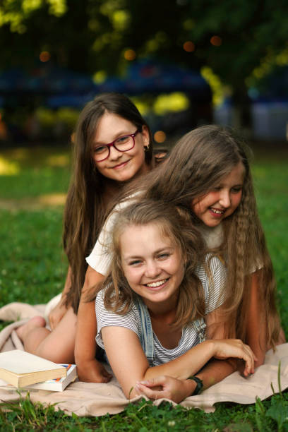 Three Sisters Hugging Stock Photos, Pictures & Royalty-Free Images - iStock