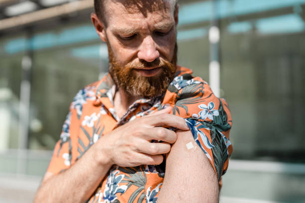 istock Man just vaccinated for COVID-19 1332814594