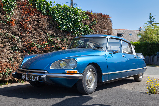 Plougasnou, France - July 17 2021: Iconic Citroen DS20 parked in the street.