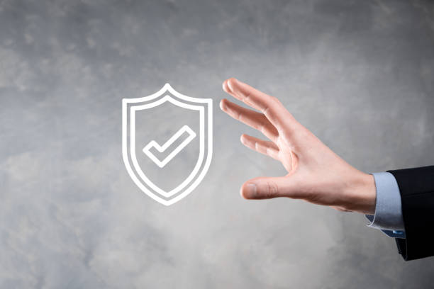 istock Protection network security computer in the hands of a businessman. business, technology, cyber security and internet concept - businessman pressing shield button on virtual screens Data protection 1332816849
