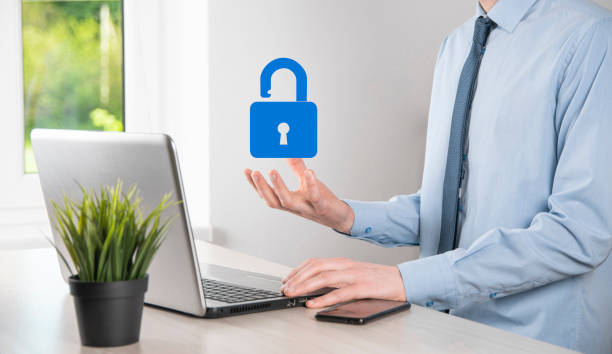 istock Male hand holding a lock padlock icon.Cyber security network. Internet technology networking.Protecting data personal information on tablet. Data protection privacy concept. GDPR. EU.Banner 1332817813