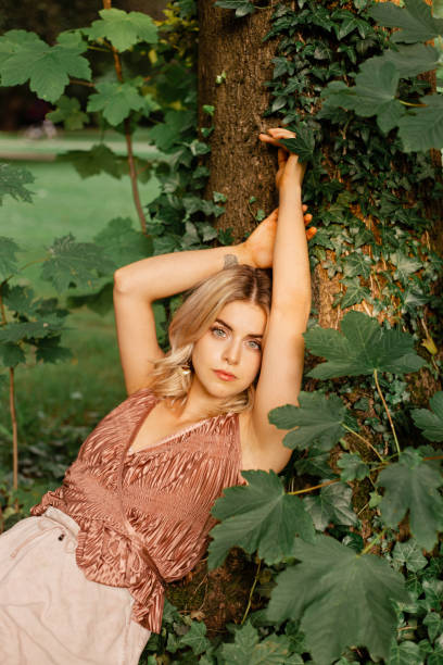 istock Woman walking in the park 1332828359