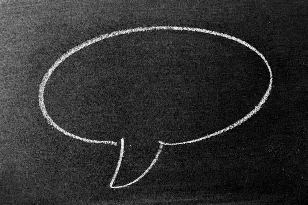 istock White color chalk hand drawing in round bubble speech shape with blank space on blackboard or chalkboard background 1332829066