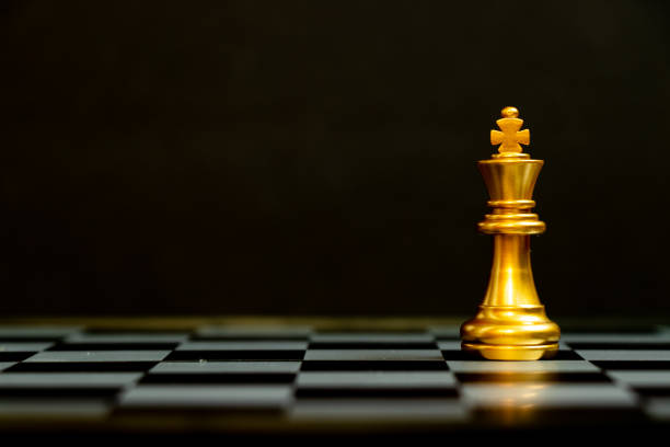 istock Gold king chess piece stand on black background with copy space (Concept for leadership, unique) 1332829146