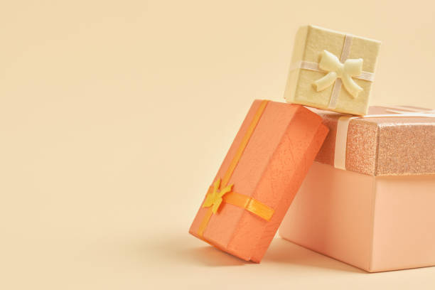 istock composition with gift boxes and pastel background, trending colors, gift boxes of different colors, sizes and shapes 1332829533