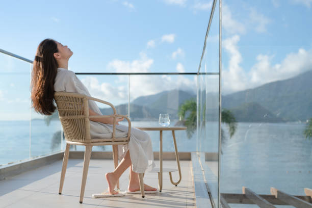 istock woman sitting on a chair 1332831665