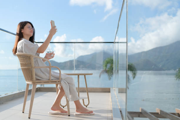 istock woman sitting on a chair 1332831705