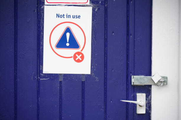 istock Not in use sign on door at train station 1332833680