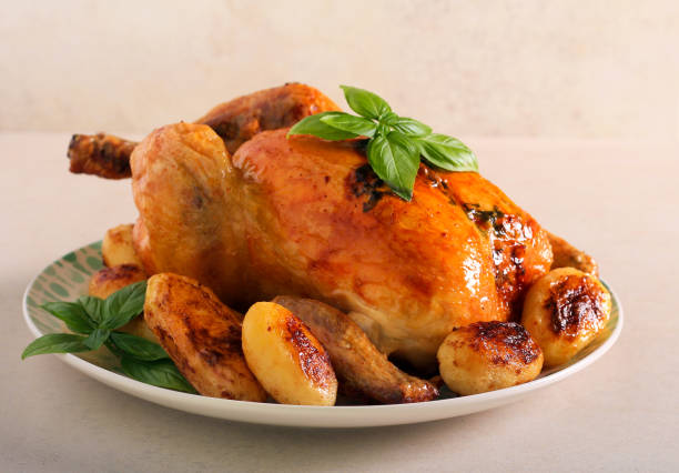 istock Roast herby chicken with potatoes 1332835457