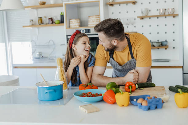 istock Cooking with children 1332837685