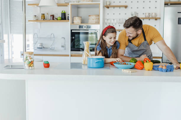 istock Cooking with children 1332837781