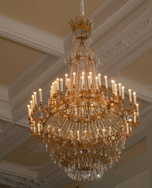 istock A large crystal chandelier hangs in the room. 1332838259