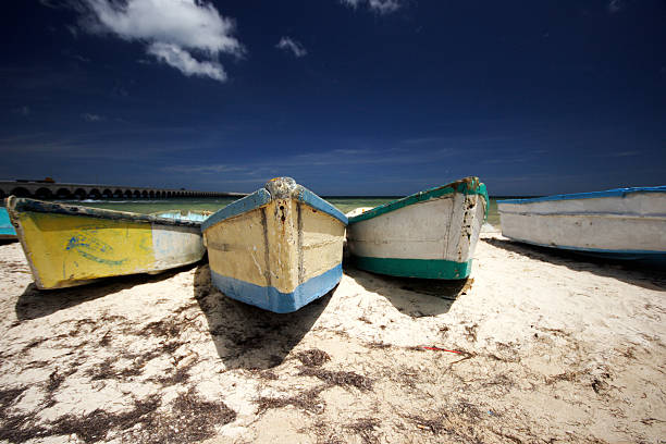 Wooden boats on beach. stock photo