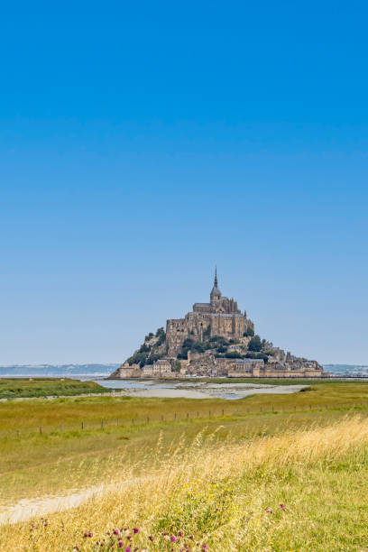istock view of Mont-Saint-Michel under a blue sky 1332838968