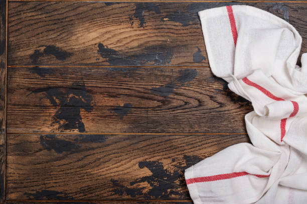 istock Kitchen towel on wooden table 1332839035