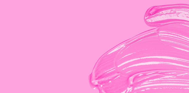 istock Transparent clear liquid gel cosmetic spot drops texture blue solid color background 1332839130
