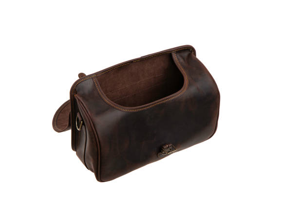 istock Brown leather bag with metal clasp. Isolate on a white background. 1332842247