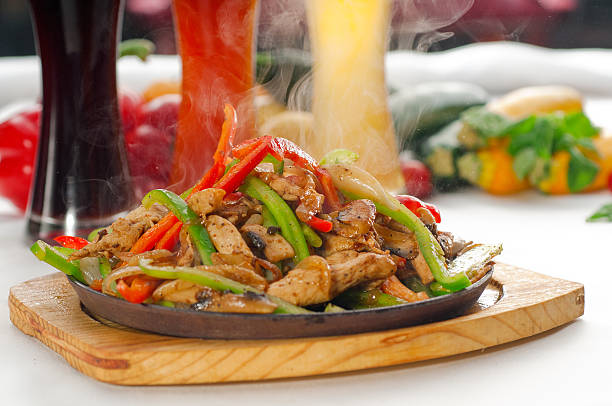 original fajita sizzling hot  on iron plate