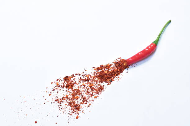 istock fresh red chili cutting and cayenne pepper isolated on white background 1332843208