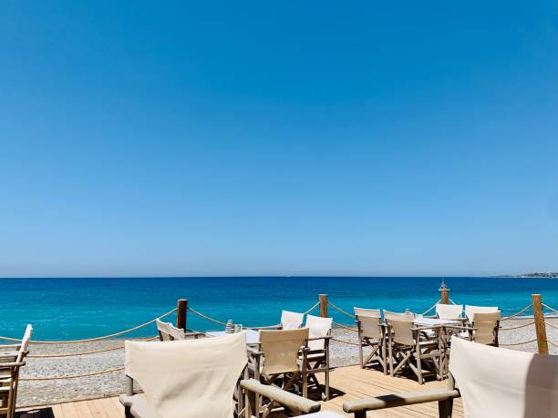 istock Summer cafe near beautiful blue sea empty 1332843690