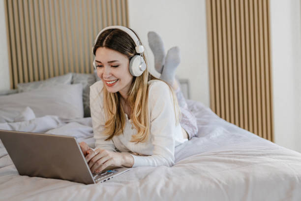 istock Cozy working from home in bedroom 1332847286