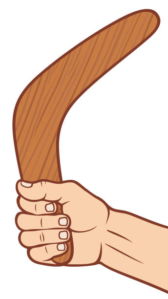 부메랑을 손에 들고 - boomerang souvenir australian culture symbol stock illustrations