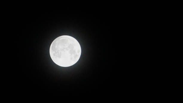 istock the full moon in the night sky is beautiful 1332848905