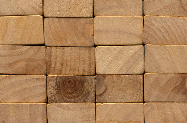 istock End view of the stack of wooden timber. 1332851645